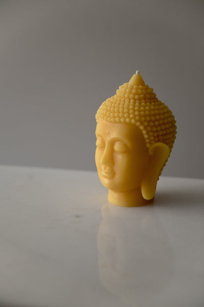 Buddha in pure beeswax form. A Candle made of only pure Canadian beeswax.