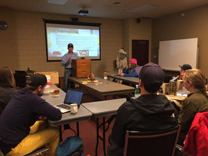 Beginner Beekeeping Course classroom with students and beekeeper teaching